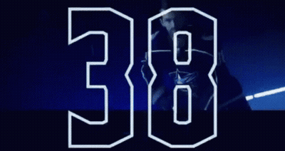 The Number 38 Is Displayed On A Blue Background GIF