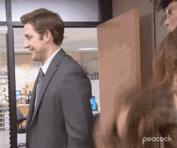 The Office Christmas Jim Hit By Belsnickel GIF