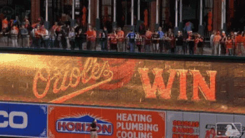 The Orioles Win Is Being Advertised On A Large Screen GIF