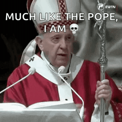 The Pope Is Giving A Speech In Front Of A Microphone And Holding A Skull On His Hat . GIF