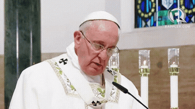 The Pope Is Wearing Glasses And A White Robe GIF