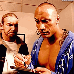 The Rock Eyebrow Raise Signing Autograph GIF