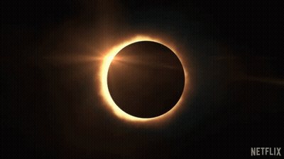 The Sun Is Partially Obscured By The Moon During A Partial Eclipse GIF