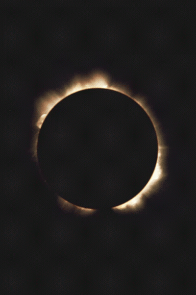The Sun Is Partially Obscured By The Moon During A Partial Solar Eclipse GIF