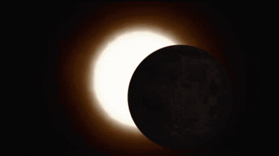 The Sun Is Partially Obscured By The Moon In An Eclipse GIF