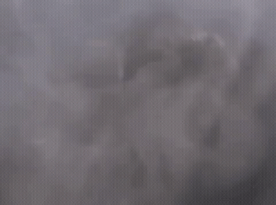 The Sun Is Shining Through The Clouds And Smoke Is Coming Out Of Them GIF
