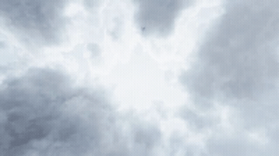 The Sun Is Shining Through The Clouds In A Cloudy Sky . GIF