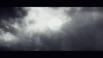 The Sun Is Shining Through The Clouds In The Sky In A Black And White Photo . GIF