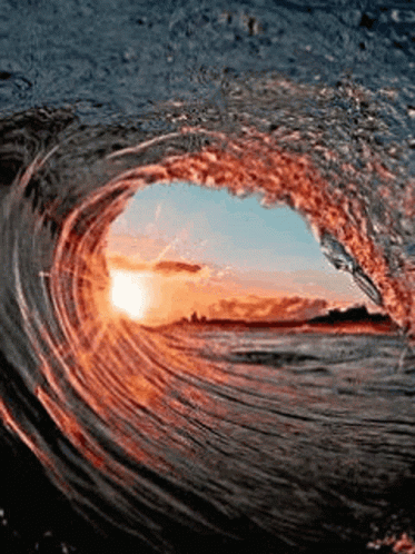 The Sun Is Shining Through The Hole In The Wave GIF