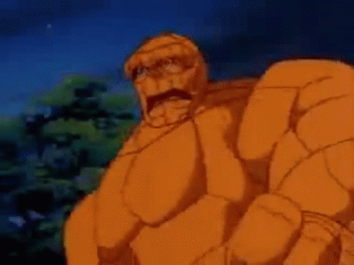 The Thing Is A Cartoon Character From The Fantastic Four Standing In The Dark . GIF