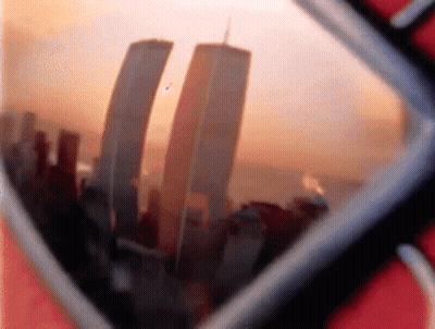 The Twin Towers Are Reflected In A Pair Of Glasses GIF