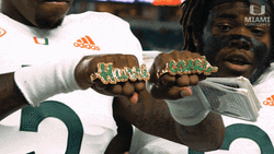 The U N Kosi Perry Kissing Knuckles GIF