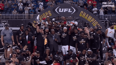 The Ufl Champions Are Celebrating In Front Of A Crowd GIF
