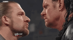 The Undertaker Facing His Opponent GIF