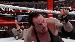 The Undertaker Looking Around GIF