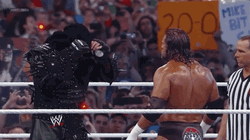 The Undertaker Removing His Bonnet GIF
