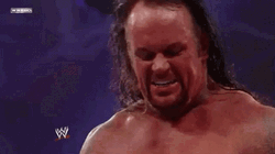 The Undertaker Saying Stay Down GIF