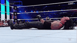 The Undertaker Slowly Getting Up GIF