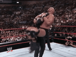 The Undertaker Throwing His Opponent GIF