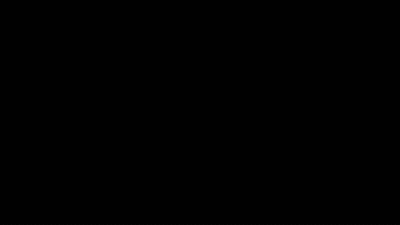 The Washington Monument Is Lit Up At Night With Trees In The Background GIF