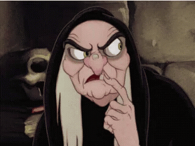 The Witch From Snow White And The Seven Dwarfs Is Wearing A Black Robe GIF