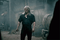 The Witcher Warrior Geralt Holding Silver Sword