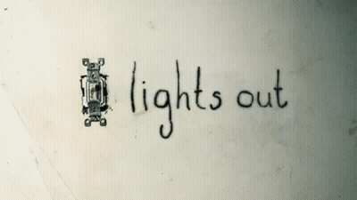 The Word Lights Out Is Written On A Wall GIF