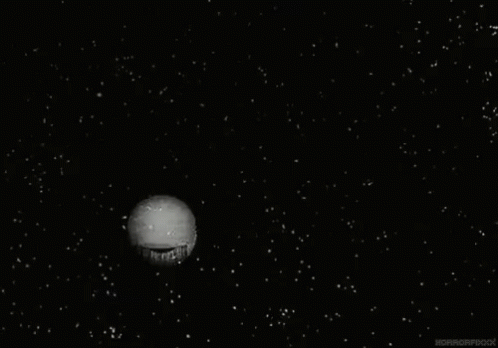 The Word Night Is Written In White Letters On A Black Background Surrounded By Snow . GIF