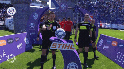 The Word Stihl Is On A Sign In The Middle Of The Field GIF