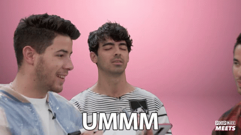 The Word Ummm That Is On A Man 'S Face GIF