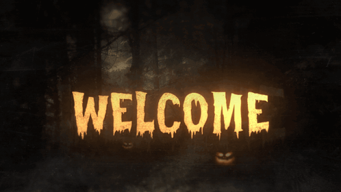 The Word Welcome Is Glowing In The Dark Surrounded By Pumpkins GIF
