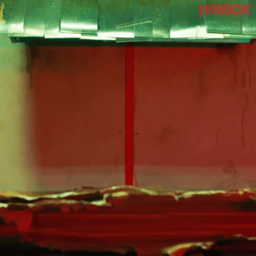 The Word Wreck That Is On A Red Wall GIF