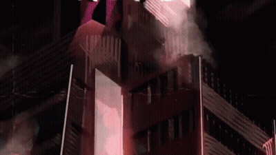 The Word You Ll Is Written In Front Of A Building With Smoke Coming Out Of It GIF
