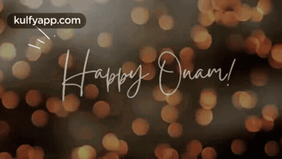 The Words Happy Onam Are Written In Cursive On A Blurry Background . GIF