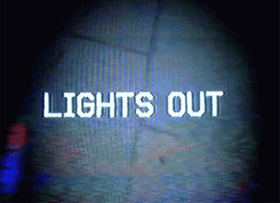 The Words Lights Out Are Displayed On A Dark Screen GIF