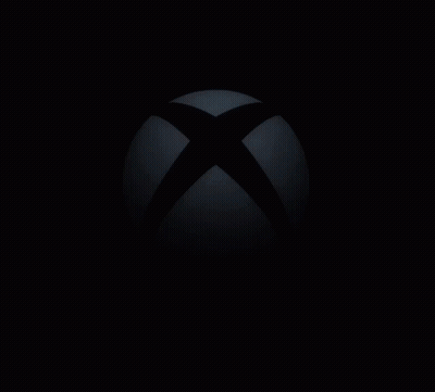 The Xbox Logo Is Glowing In The Dark With The Sun Shining Through It GIF