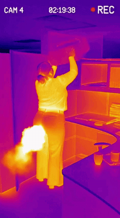 Thermal Image Woman Standing In Room GIF