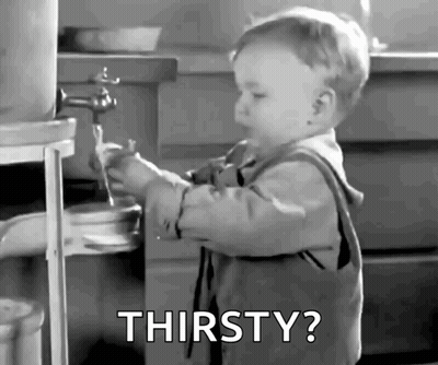 Thirsty Baby Drinking From Faucet GIF