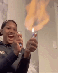 This Girl Is On Fire Playing GIF