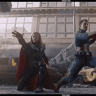 Thor And Captain America Fighting In Front Of Group Hug Building GIF