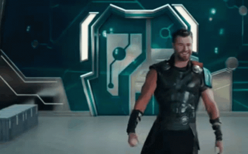 Thor Is Standing In Front Of A Door With The Letter P On It . GIF
