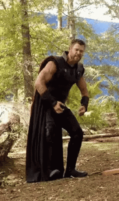 Thor Standing In Forest In Black Cape GIF