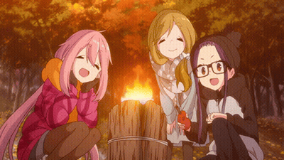 Three Anime Girls Are Sitting Around A Campfire In The Woods GIF