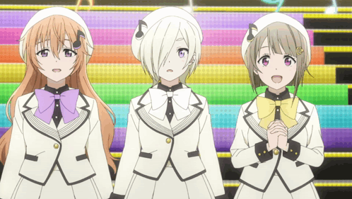 Three Anime Girls Are Standing Next To Each Other In Front Of A Rainbow Background GIF
