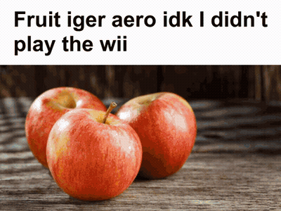 Three Apples On A Wooden Table With The Words Fruit Iger Aero Idk I Didn 'T Play The Wii GIF