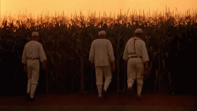Three Baseball Players Walking Through Corn Field GIF