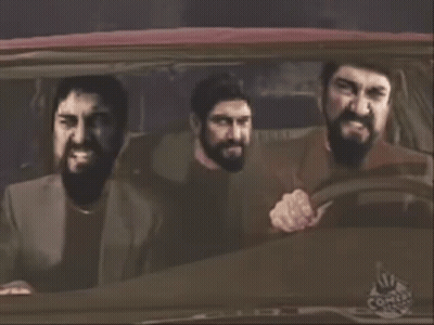 Three Bearded Men In A Car With Comix Logo GIF