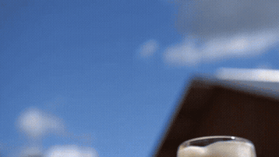 Three Beer Mugs Blue Sky Clouds GIF