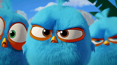 Three Blue Angry Birds Standing With Eyes Closed GIF
