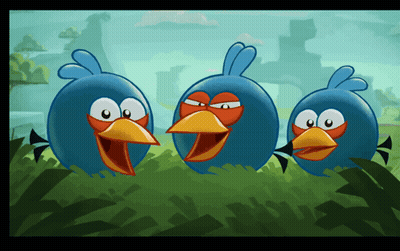Three Blue Birds With Orange Beaks Standing In Grass GIF